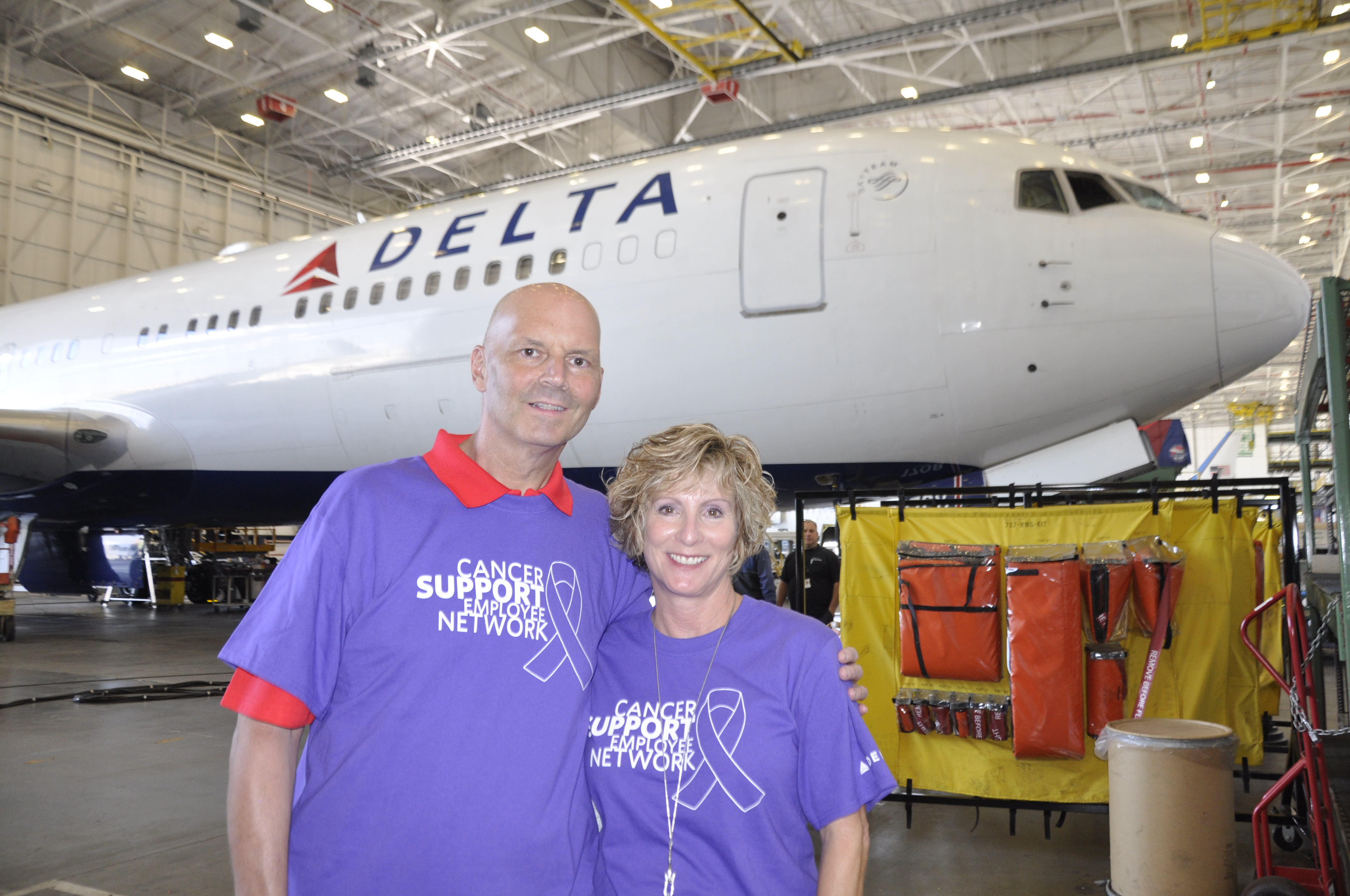 Delta Airlines TechOps empolyee, cancer survivor honored with a visit from former NFL Player