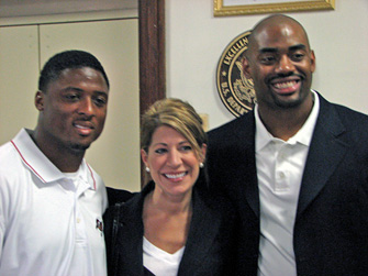 Chris Draft and Warrick Dunn join U.S. Secretary of Education Margaret Spellings at Banneker High School