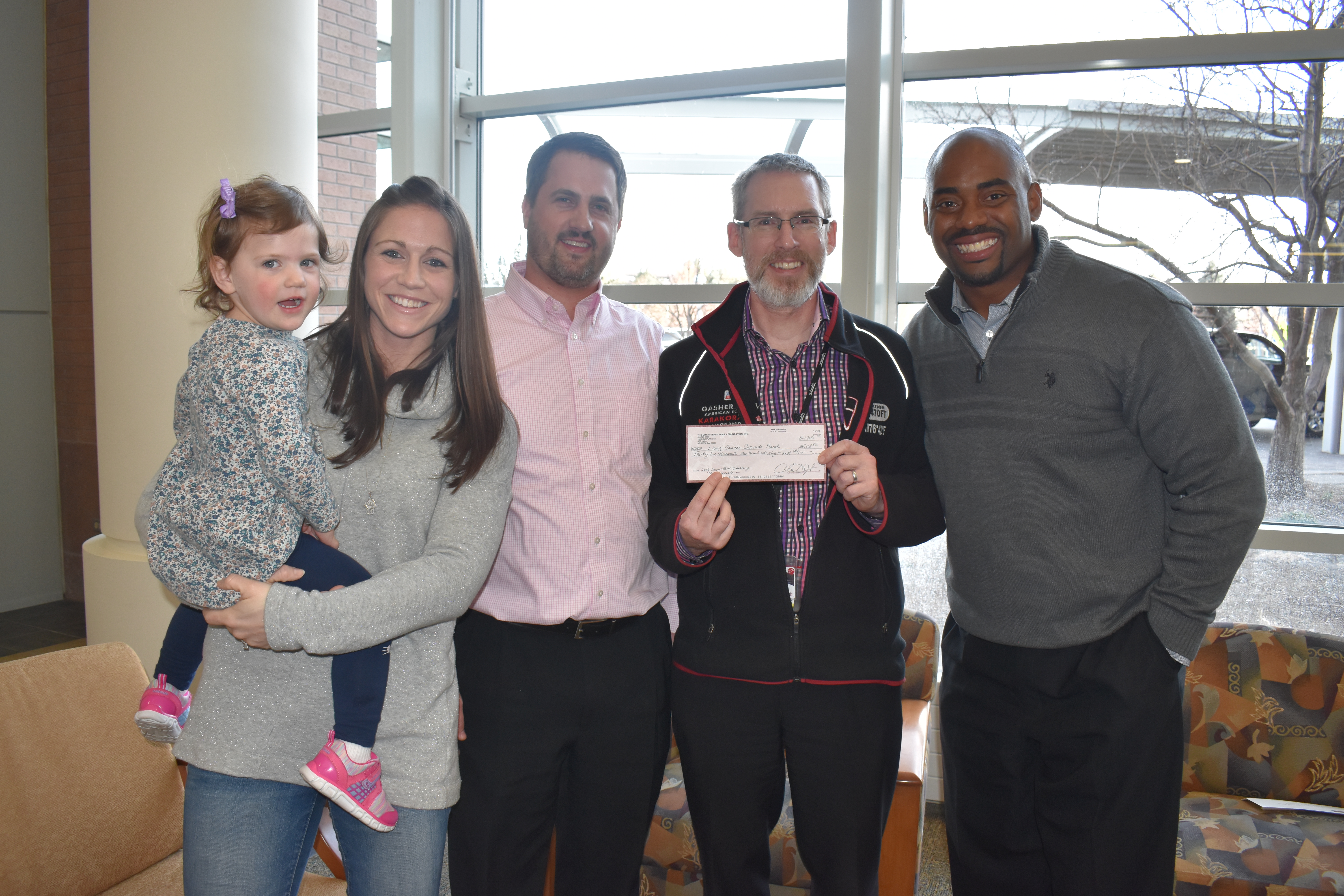 Matt & Jen Arsensdorf Presented a Check to the Lung Cancer Colorado Fund 