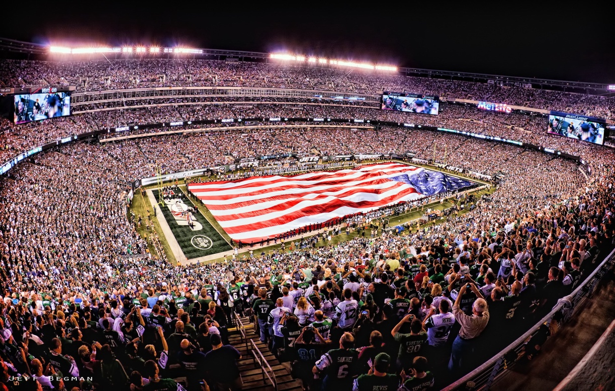 NEW YORK - Servicemembers from all five branches participate in a ceremony  during the halftime show at the New York Giants vs. the Philadelphia Eagles  Military Appreciation Game at MetLife Stadium in